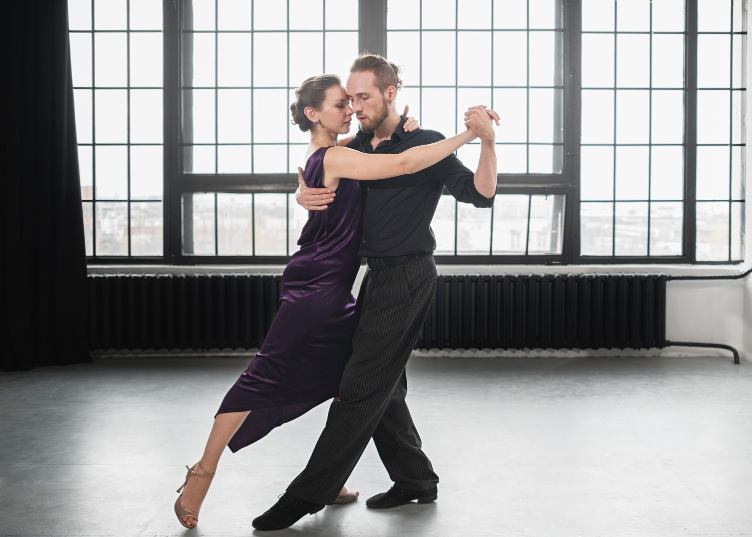 Beautiful elegant people dancing tango