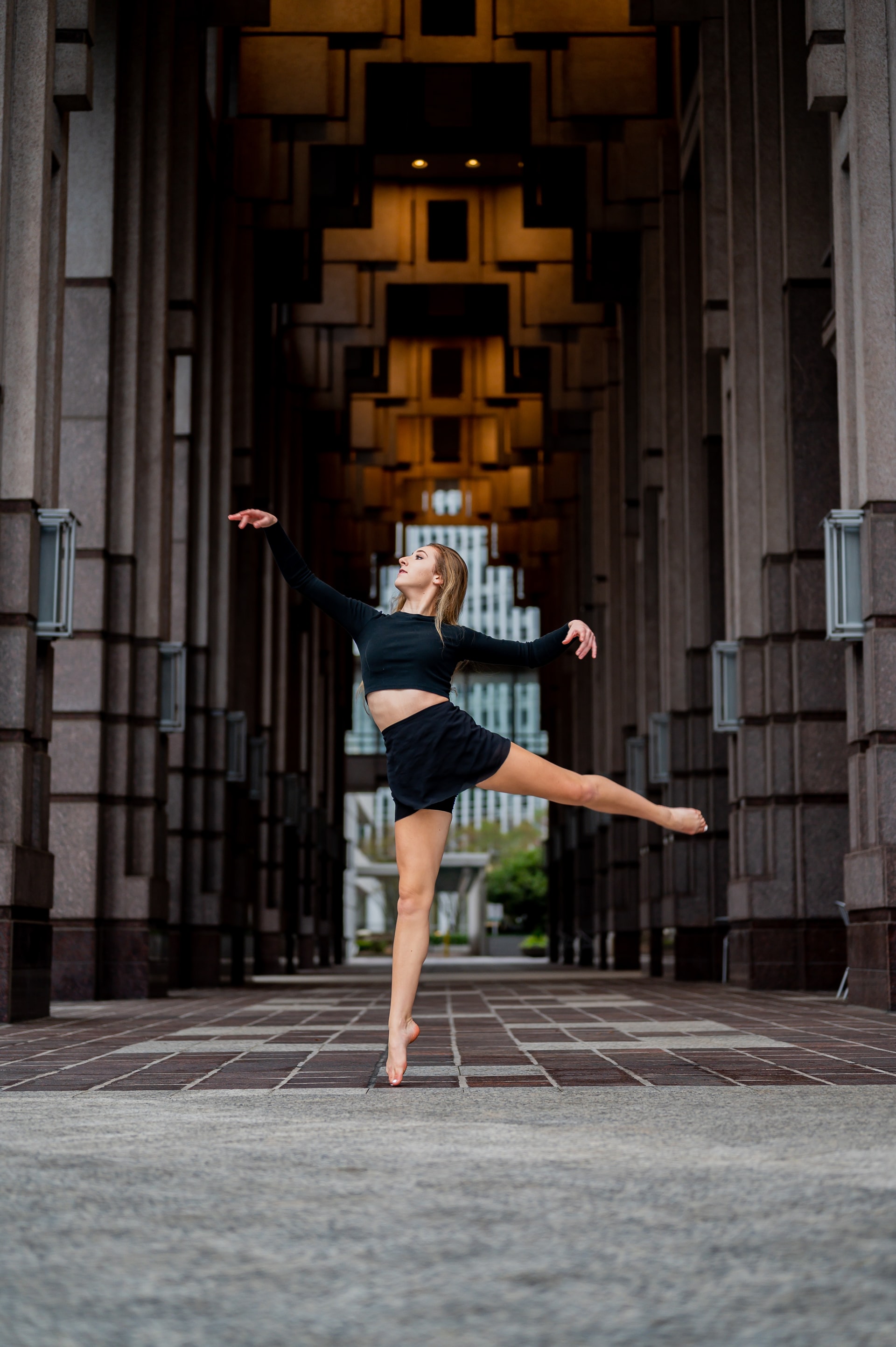 girl dancing in front of dance studio
