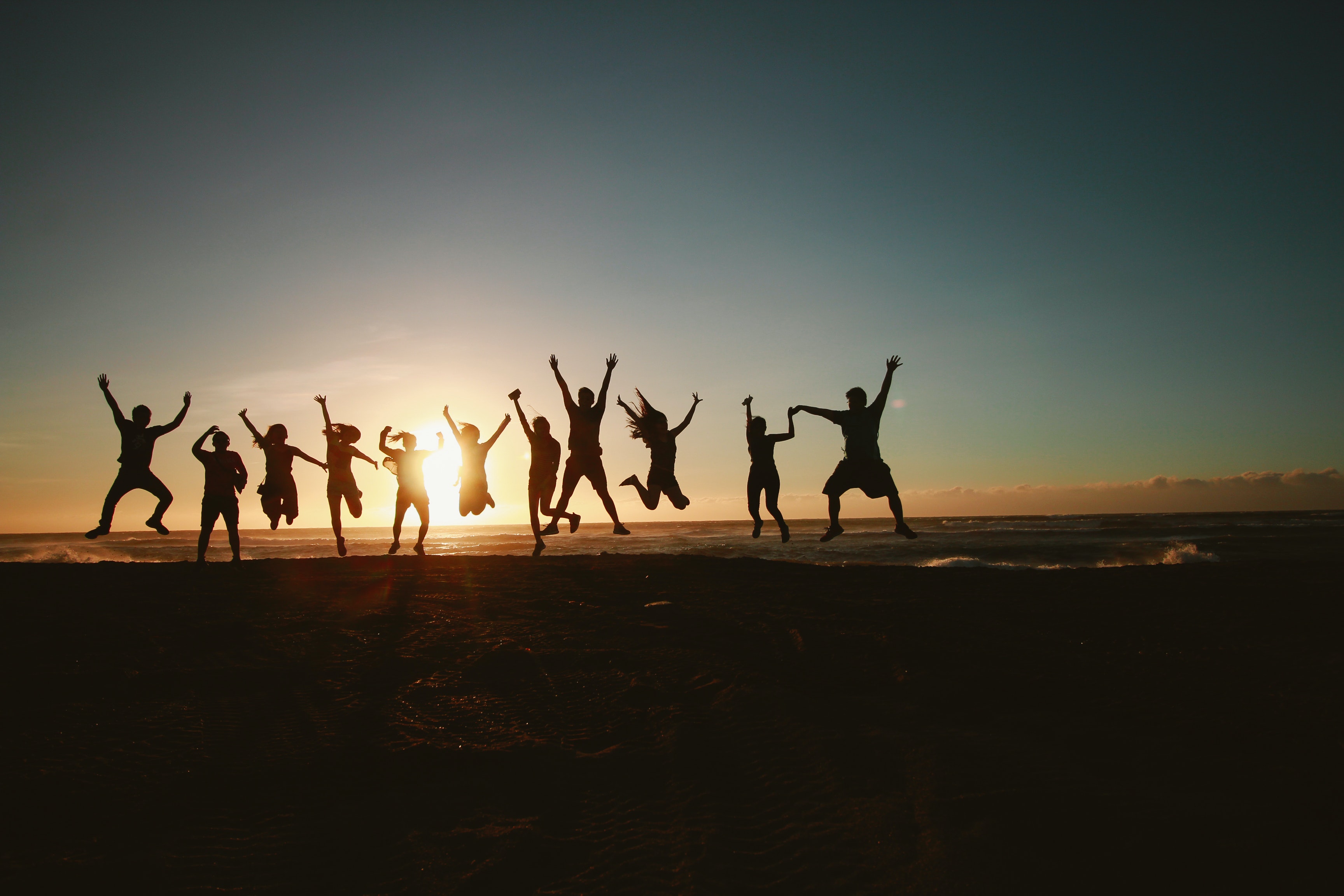 group of dancers on the beach marketing a dance studio